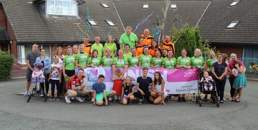Group of fundraisers gathered outside Hope House Children's Hospice
