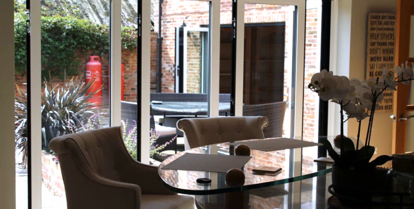 patio doors open dining room bright sunny outside